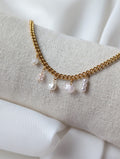Bracelet doré en acier inoxydable avec perle d'eau douce et une pierre de quartz rose
