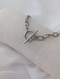 Collier en acier inoxydable argenté avec un fermoir en T