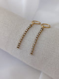 Boucles d'oreilles pendantes dorées en acier inoxydable et strass