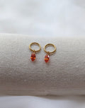 Boucles d'oreilles en titane avec des zircons oranges taille Marquise – 8 mm