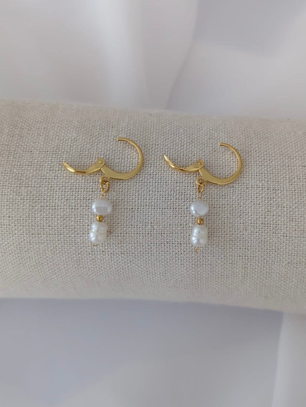 Boucles d'oreilles en acier inoxydable avec des perles d'eau douce