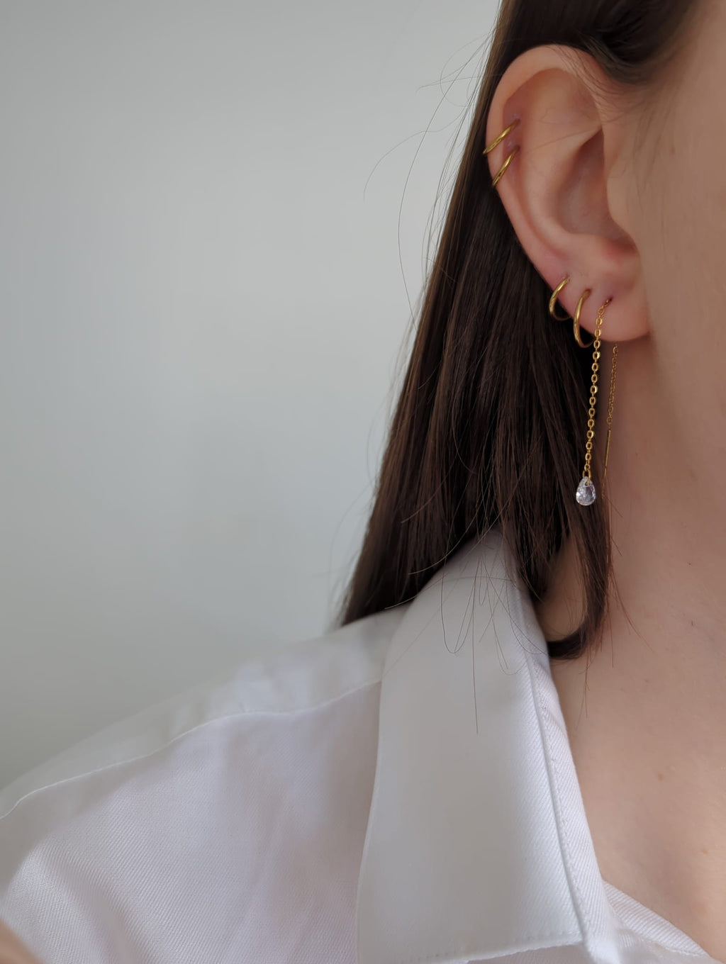Boucles d'oreilles pendantes en acier inoxydable doré avec zircons