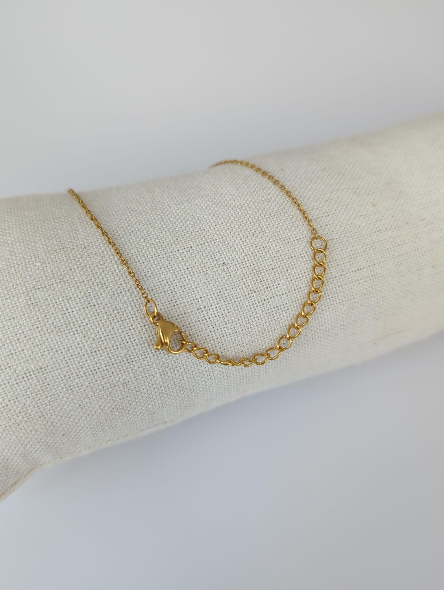 Collier doré en acier inoxydable avec pendentif zircon ovale vert et zircon couleur champagne