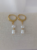 Boucles d'oreilles en acier inoxydable avec des perles d'eau douce