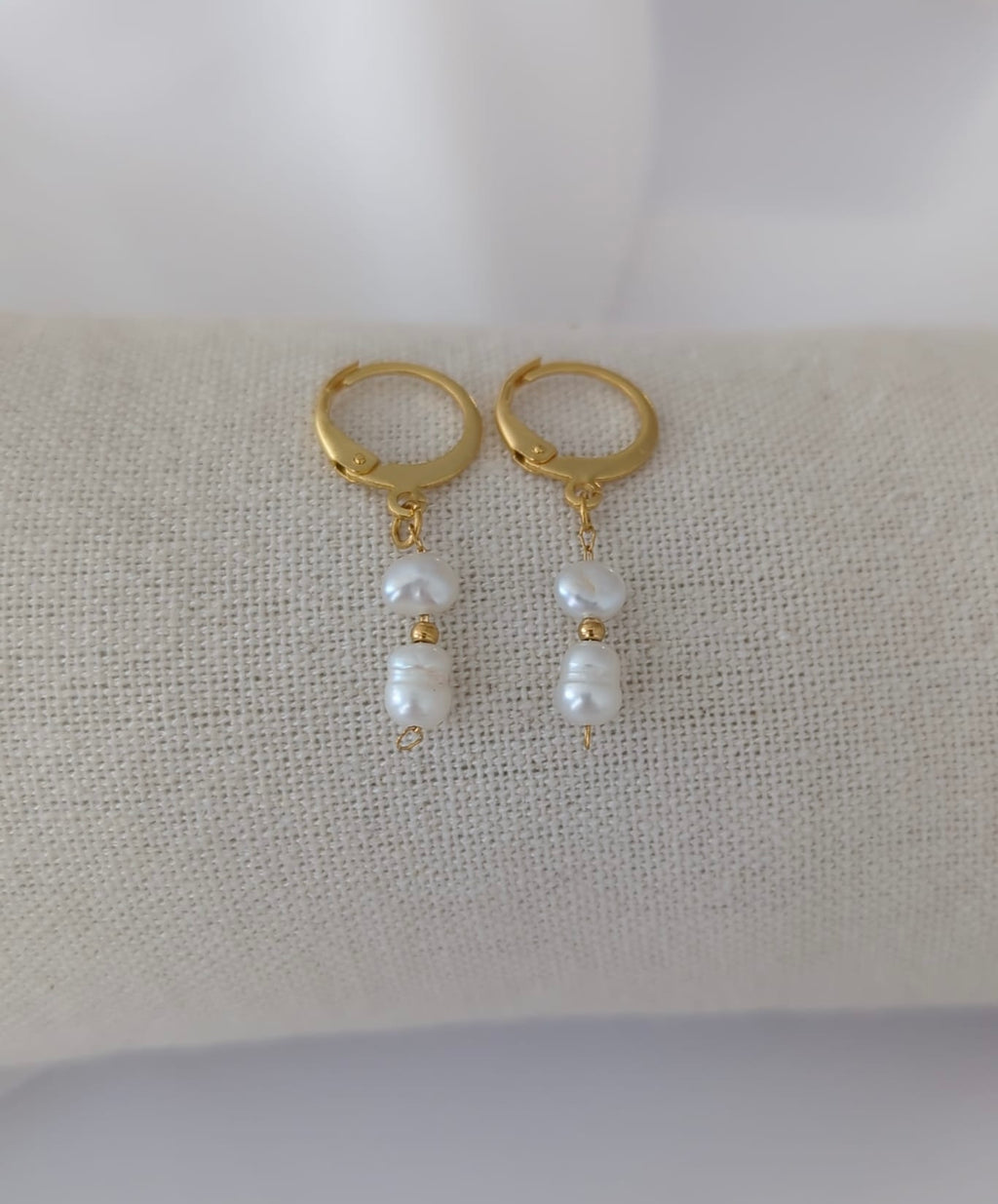 Boucles d'oreilles en acier inoxydable avec des perles d'eau douce
