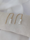 Boucles d'oreilles dorées longues en acier inoxydable avec des perles d'eau douce de 5 mm