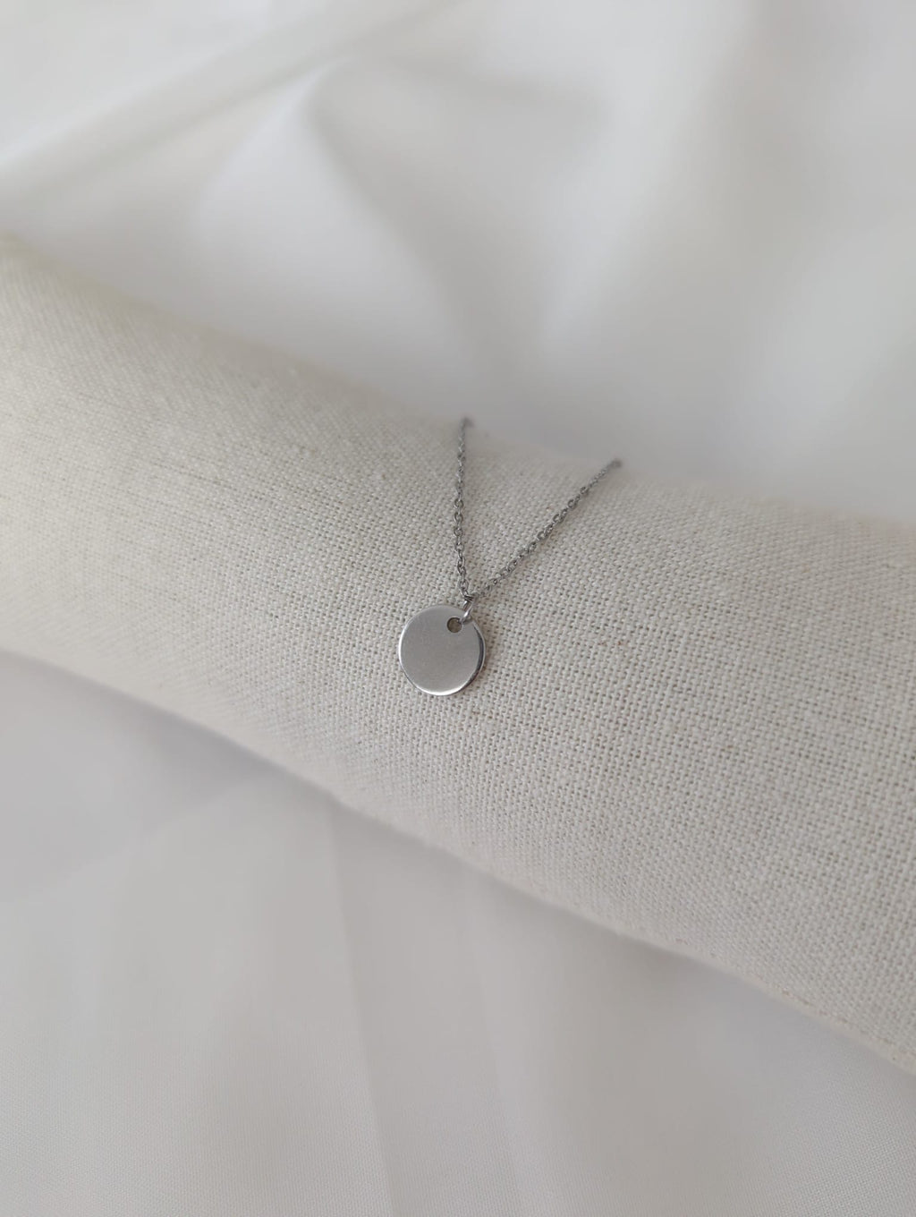 Collier en acier inoxydable doré ou argenté avec pendentif rond en acier