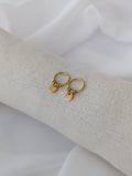 Boucles d'oreilles dorées en titane avec breloques rondes lisses ou à motifs